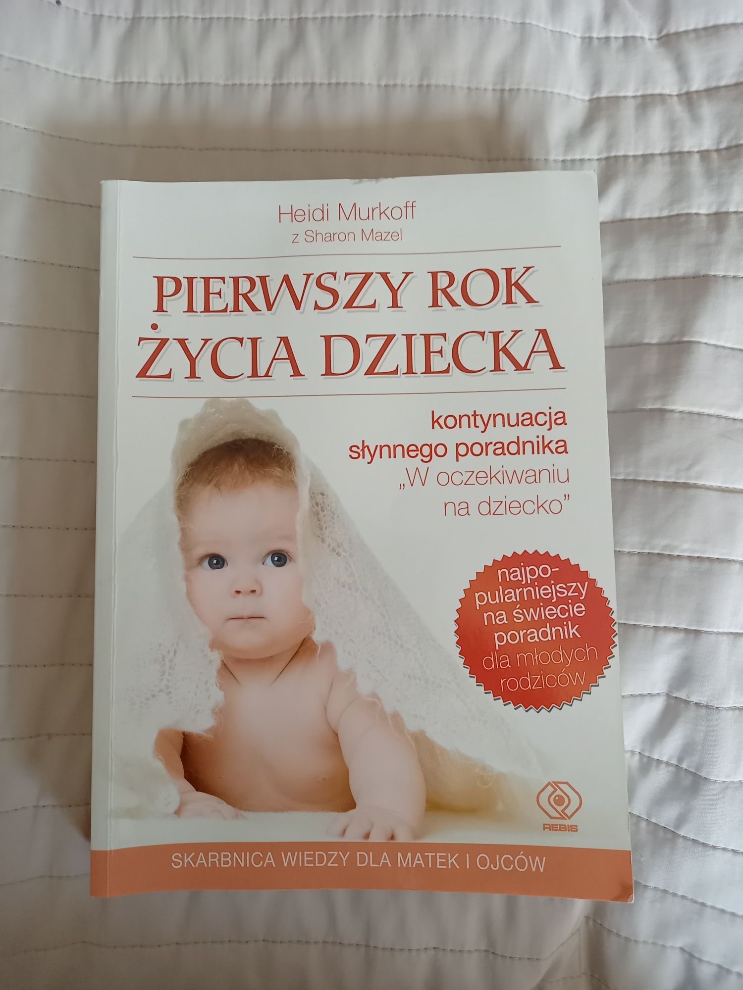 Książki: "Warto karmić piersią" i "Pierwszy rok życia dziecka"