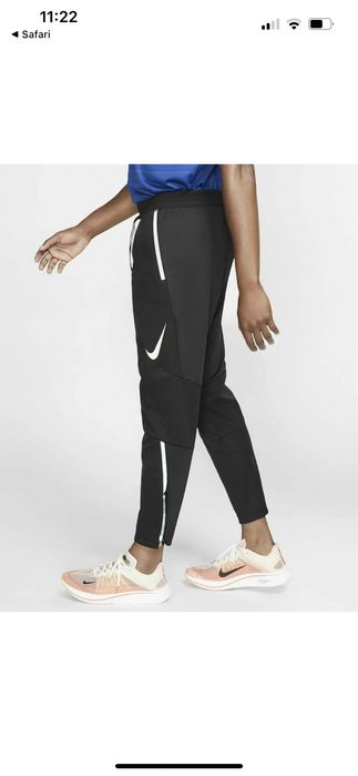 Нові оригінальні менакруті штани для бігу nike swift shield