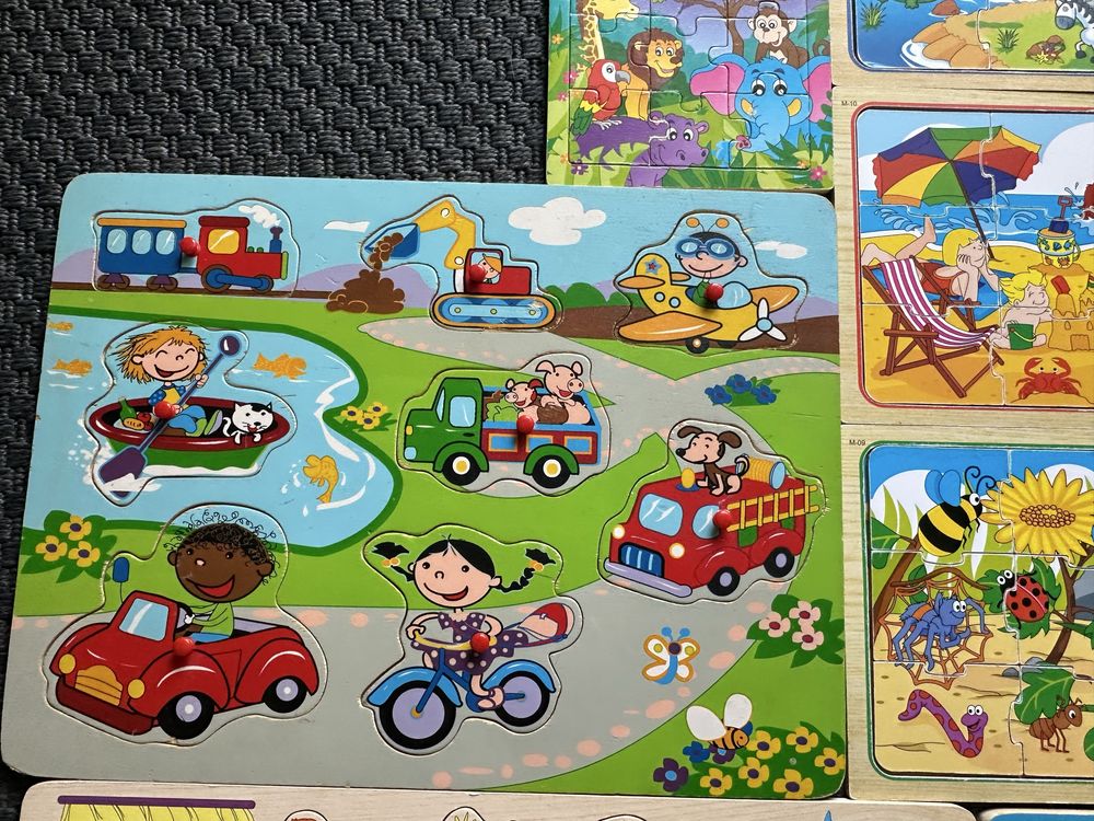 Zestaw 11 drewnianych ukladanek/puzzli dla dzieci w stanie idealnym
