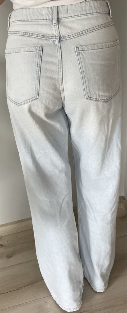 Jasne szerokie spodnie wide leg luźne jeansy jeansowe dżinsowe 38 M