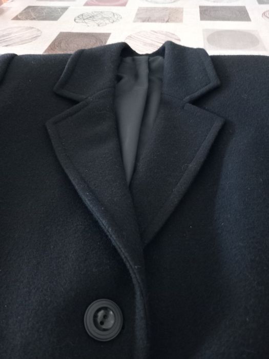 Casacos e botas de senhora em segunda mão