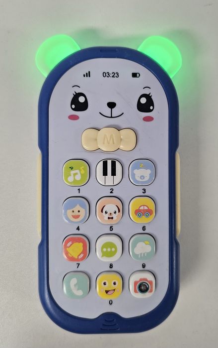 Zabawkowy telefon z dźwiękami, muzyką i światełkami