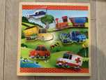 Drewniane puzzle układanka Toys R us Pojazdy