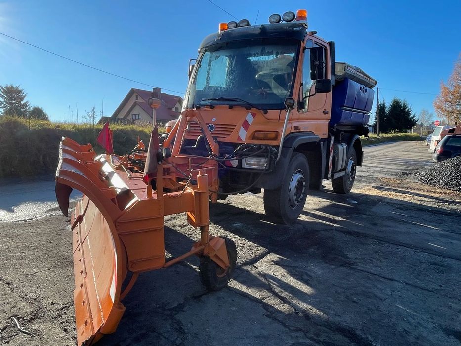 Unimog u 400  unimog  U-400 2009 schmidt pług do  zimowego utrzymania dróg