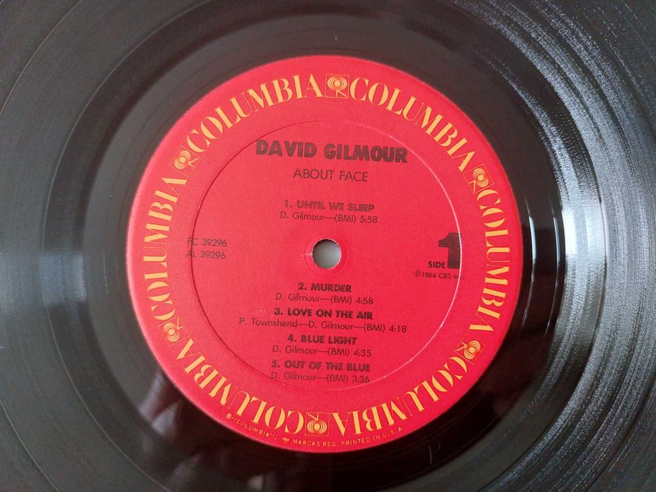 Продам виниловую пластинку David Gilmour 1984 About Face