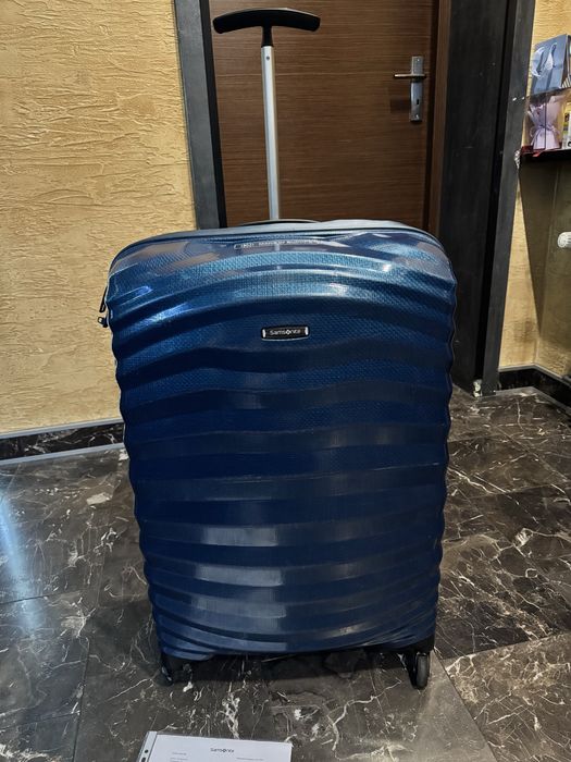 Walizka Samsonite Lite-Shock (American Tourister, Delsey)