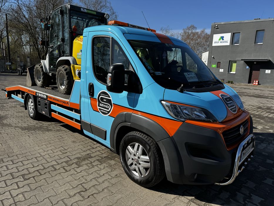 TANIO laweta pomoc drogowa holownik transport aut  24h