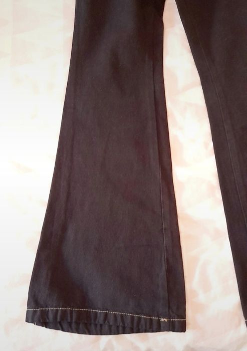 Calças de ganga pretas boca de sino 32