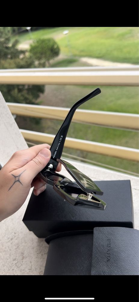 Oculos sol Prada SPR06Y Symbole