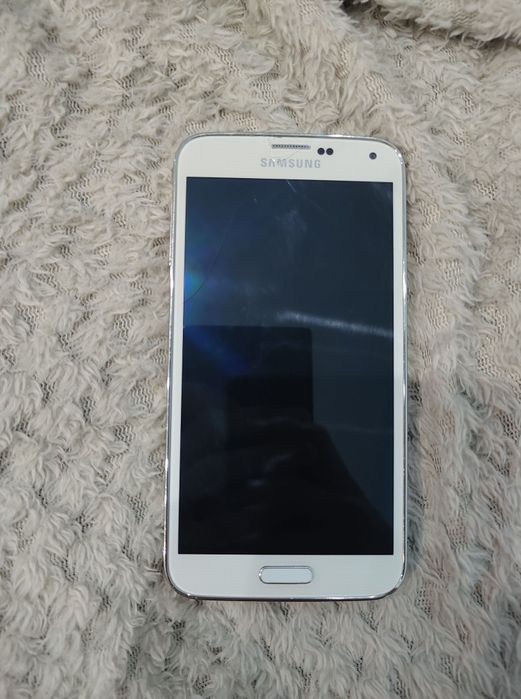 Samsung Galaxy S5 Stan dobry, pęknięcia na szkle