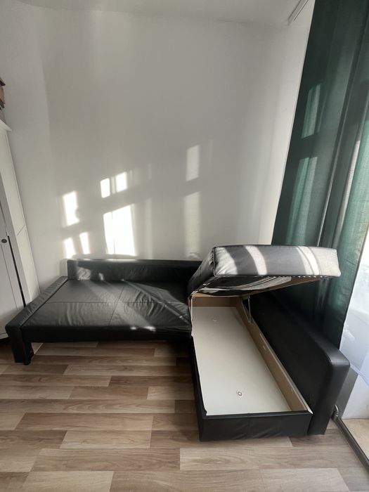 Czarny narożnik z funkcją spania