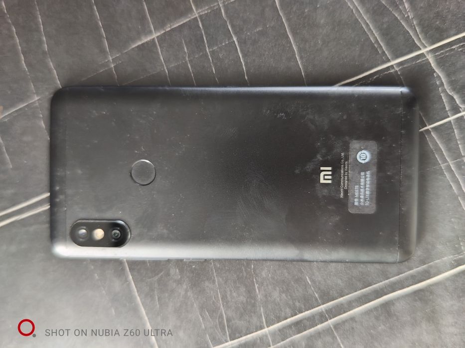 продам телефон, фотоапарат, часи