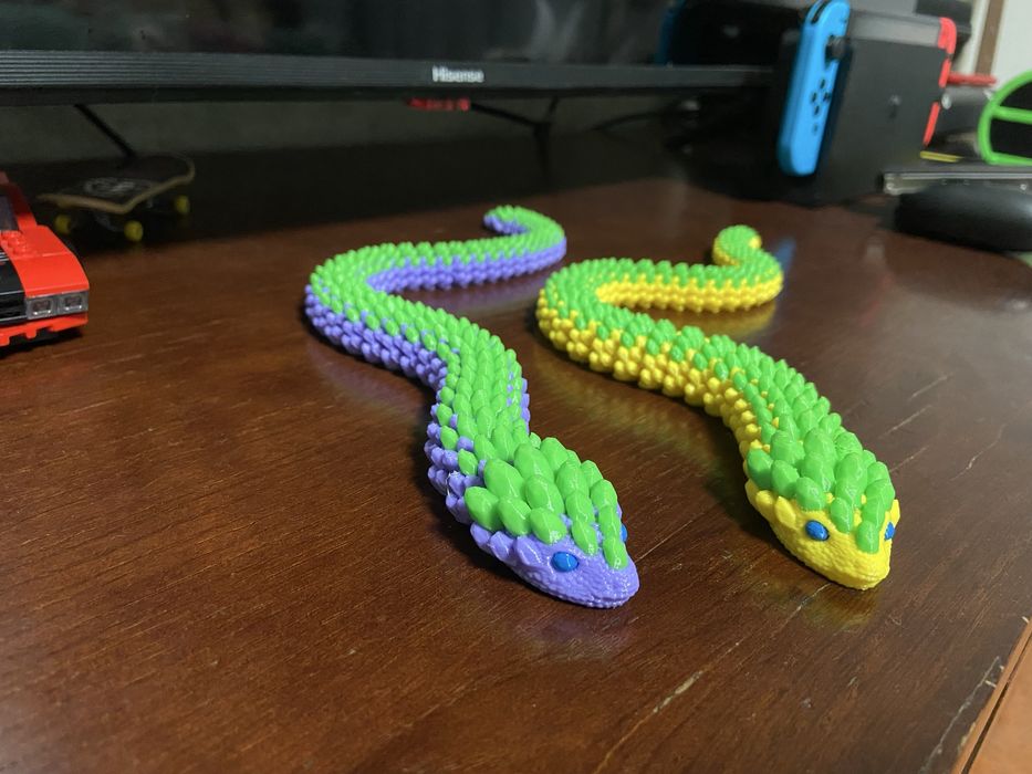 Brinquedo cobra articulada