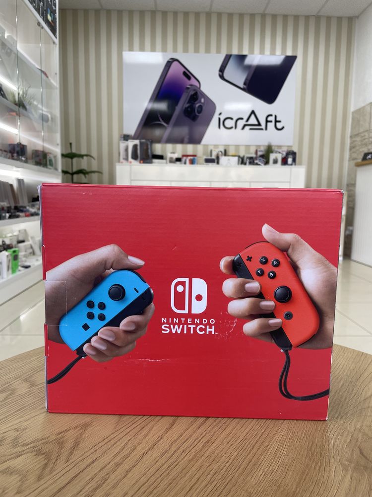 Nintendo Switch with Neon Blue and Neon Red Joy-Con (045496452629)