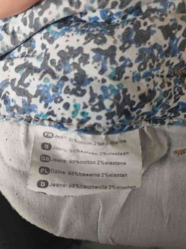 Dżinsy spodnie XL z przetarciami z wzorem w niebieskie kwiaty