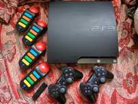 Konsola PS3 250GB+około 10gier+kierownica Logitech+Gitara