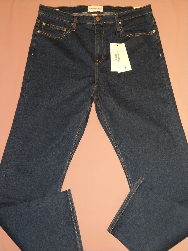 Wyprzedaż spodnie męskie Calvin Klein Jeans.