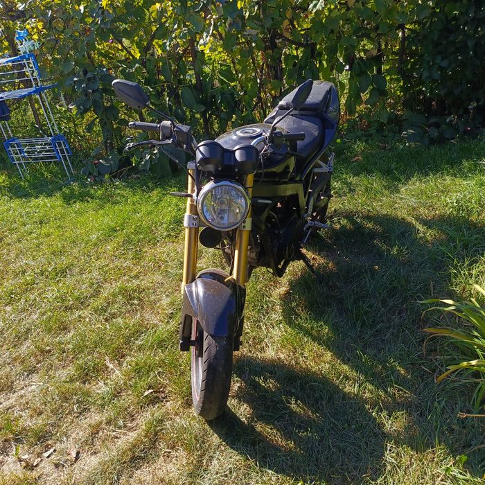 Мотоцикл Хюсонг 250 gt.