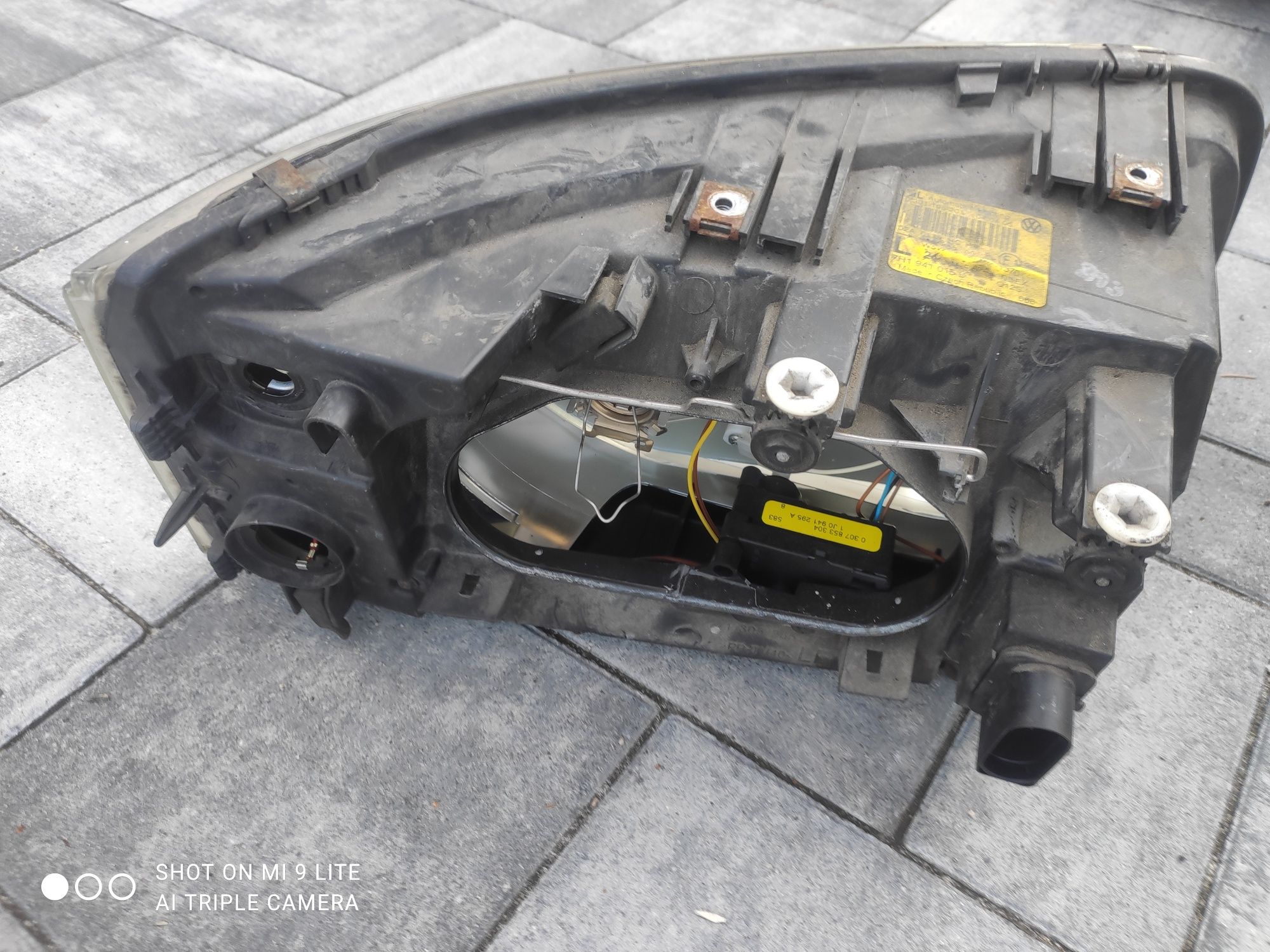 Lampa reflektor przedni przód Volkswagen Transporter T5 Oryginał Europ