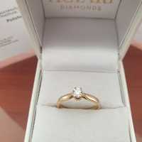 Złoty pierścionek z naturalny brylantem  z  certyfikatem