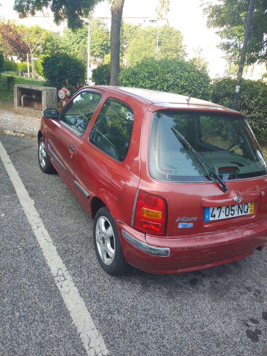 Micra motor 1.0 de 3 portas. Troca por moto