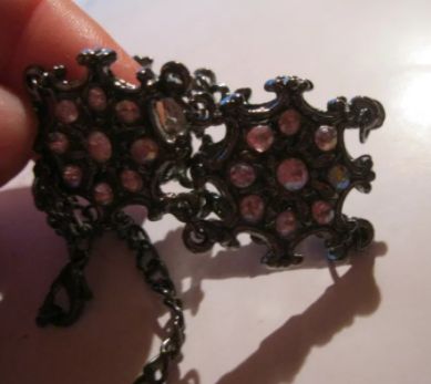 браслет украшение нарядный под темное серебро с розовыми камнями