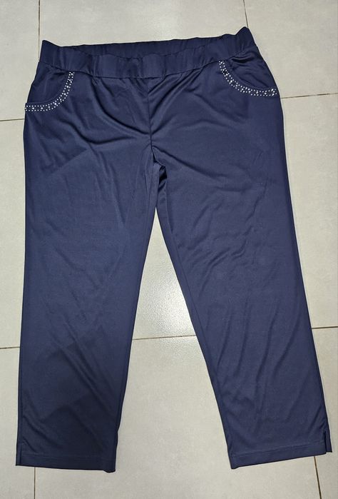 Eleganckie spodnie z aplikacją roz.56 (8 XL) granatowe , połyskujące,