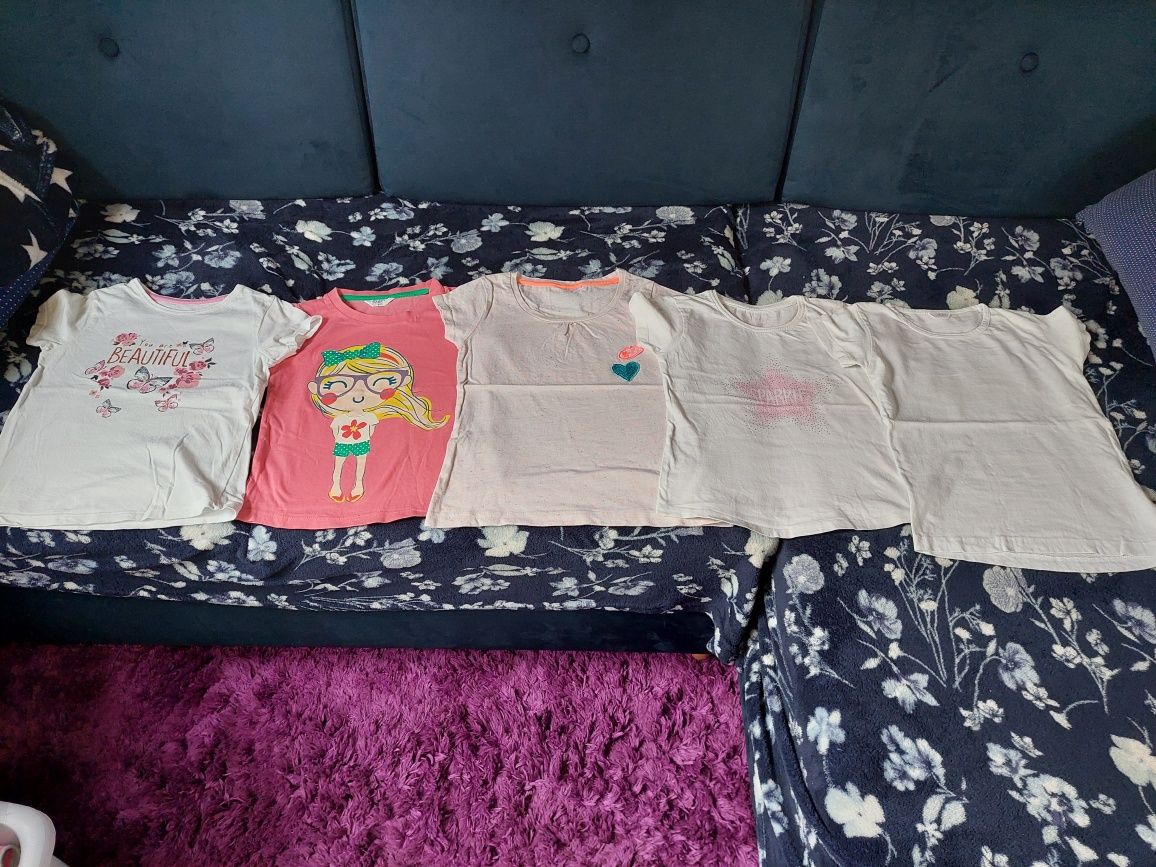 Bluzeczki t-shirty dla dziewczynki krótki rękaw 116-122cm. 9 Sztuk.