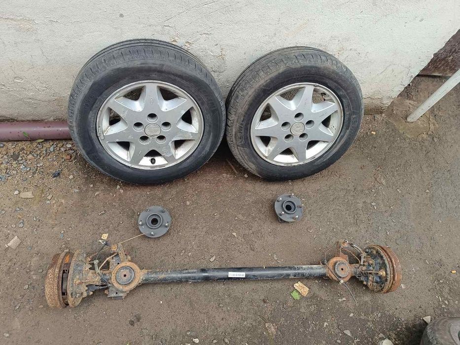 Балка для прицепа з дисками ступици для прицепа чи мотоблока