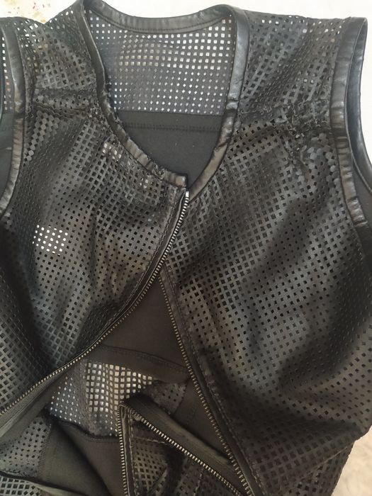 Sukienka skórzana.Calvin Klein