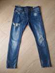 Spodnie jeansowe DIESEL TEPPHAR slim-carrot