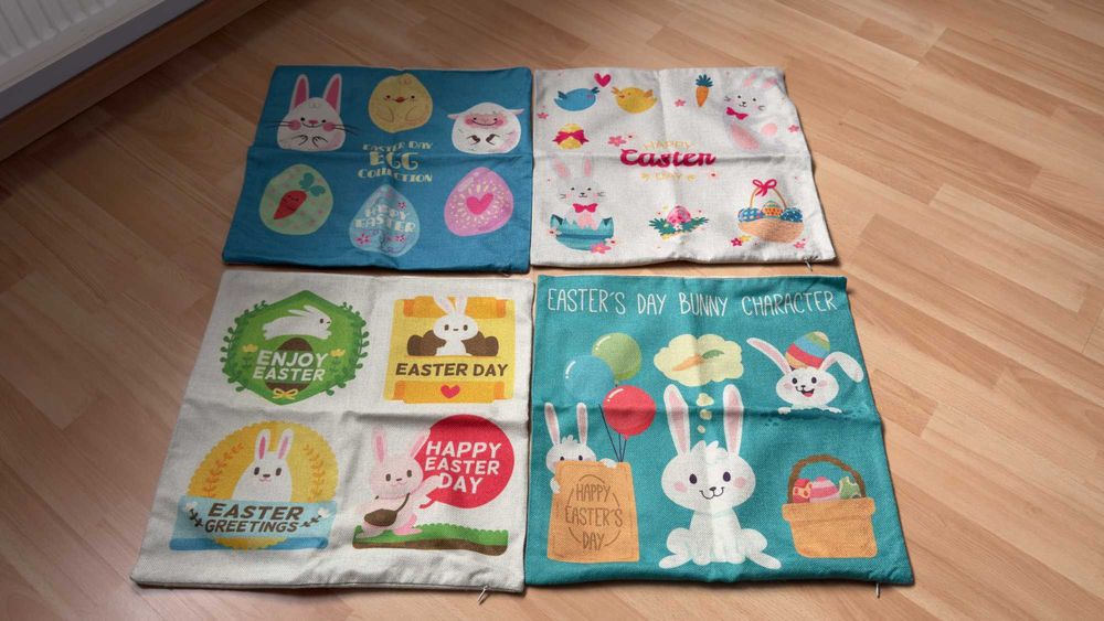 Zestaw czterech ozdobnych wielkanocnych poszewek 45x45