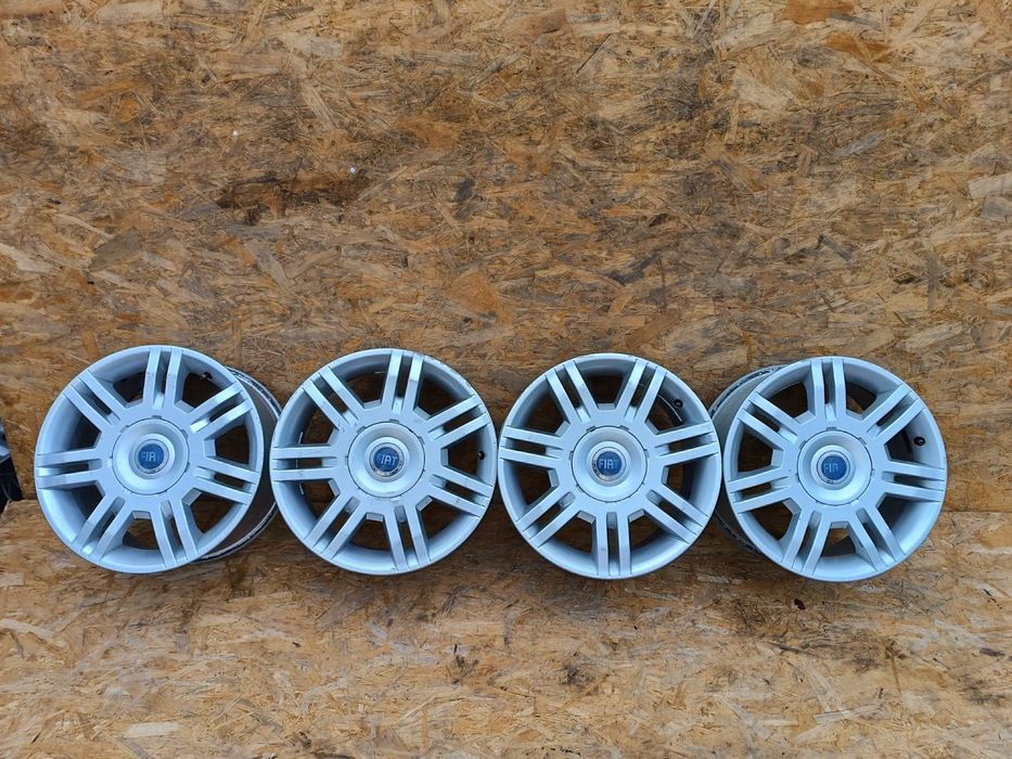 FIAT FELGI ALUMINIOWE ET41 4x98 7Jx15 4SZT FI58,1 46329058 komplet