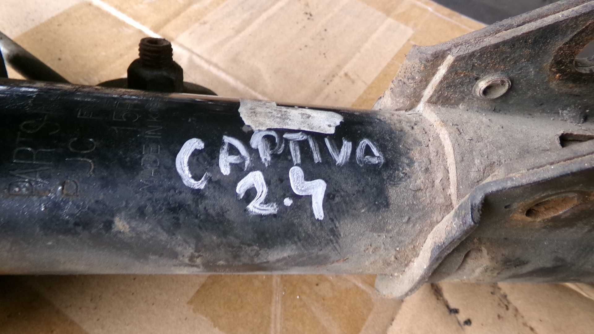 Kwi5 Amortyzator + sprężyna mcperson przedni lewy captiva 2.4