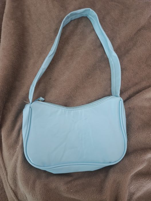 Синя маленька сумка