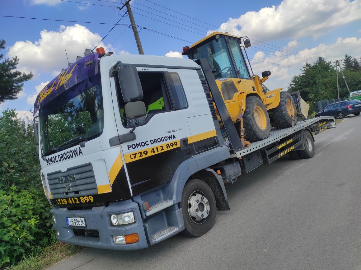 Pomoc drogowa transport maszyn rolniczych budowlanych