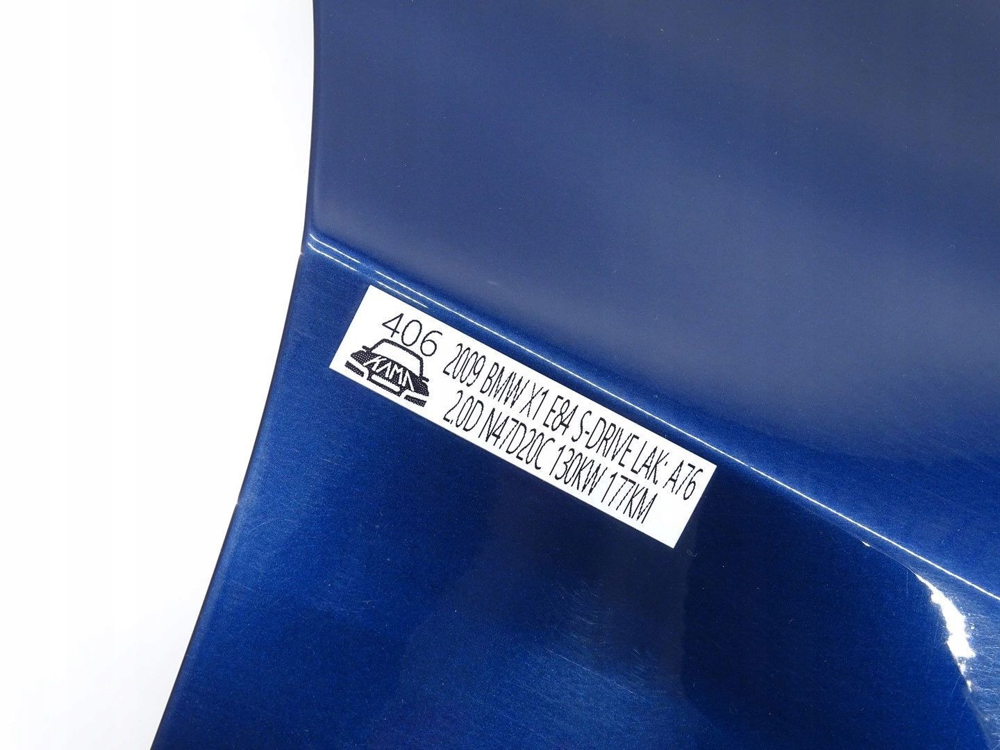 BŁOTNIK PRAWY PRZÓD PRZEDNI BMW X1 E84 09-12R LAK A76 TIEFSEEBLAU METALLIC