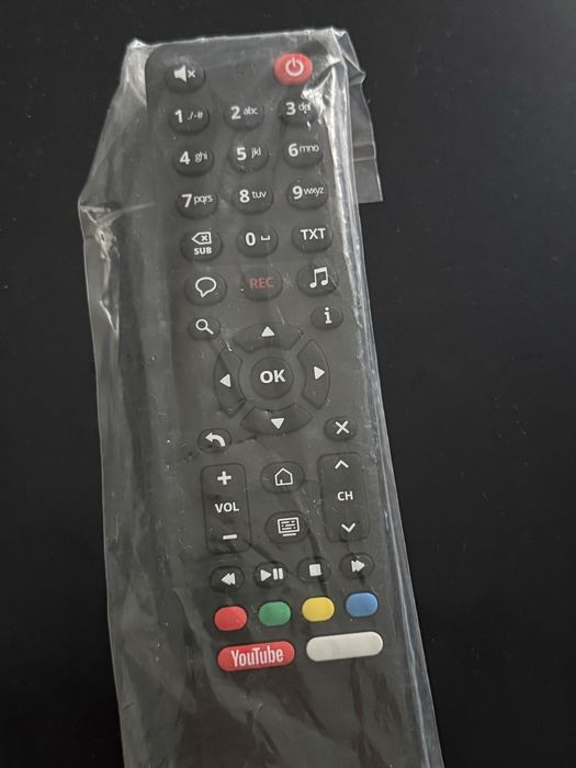 Pilot Netia Nowy zafoliowany z przyciskiem Youtube