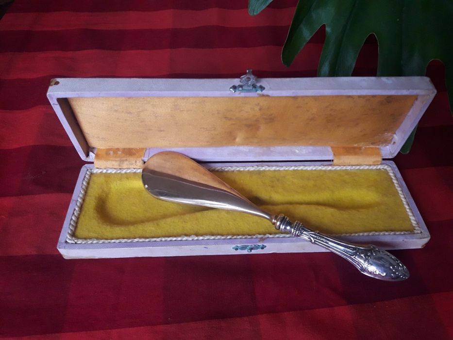 Calçadeira prata e cobre