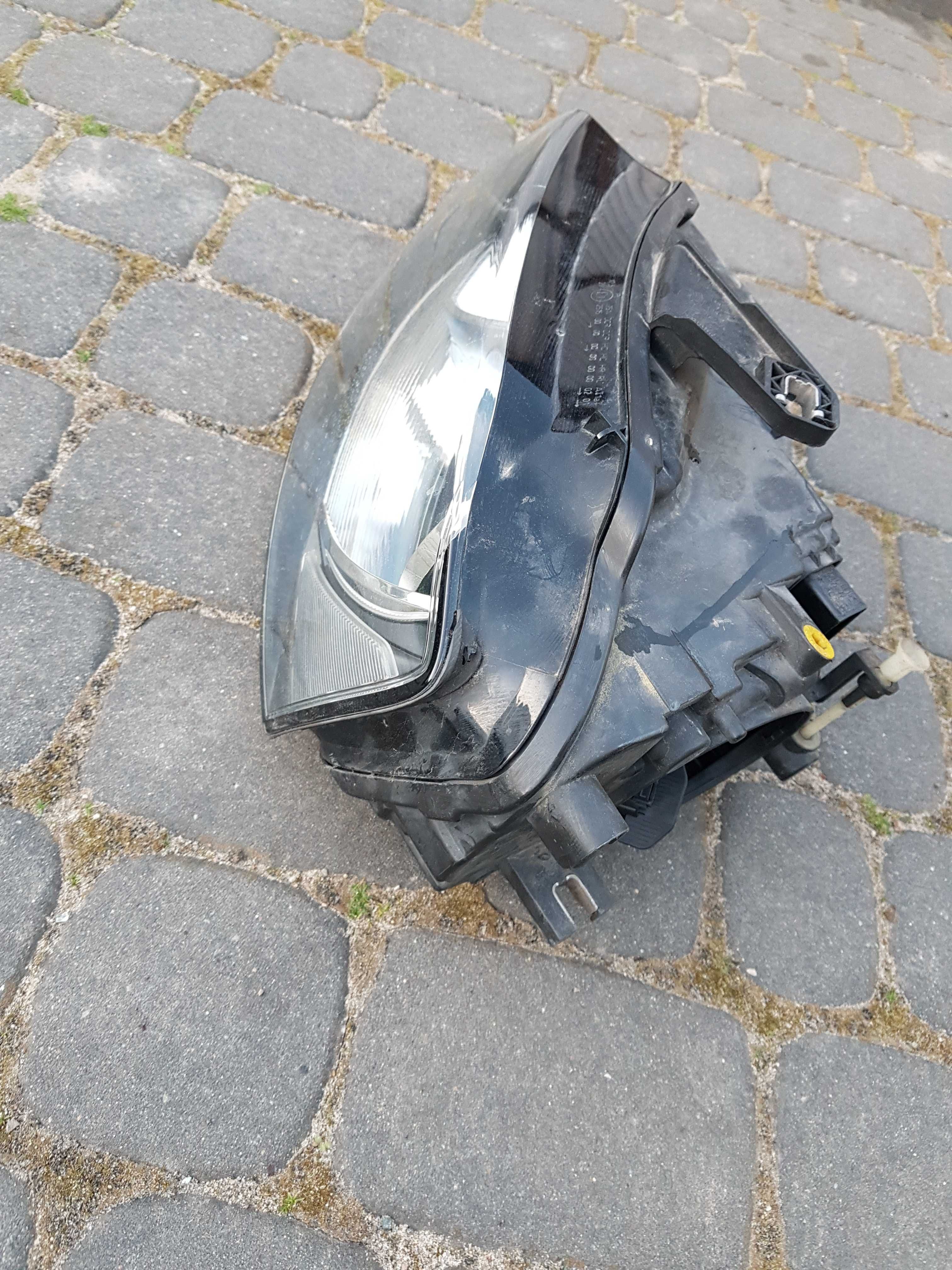 Lampa lewa lewy przod Europa Hella Oryginal Audi A3 8P FL Lift 2010r