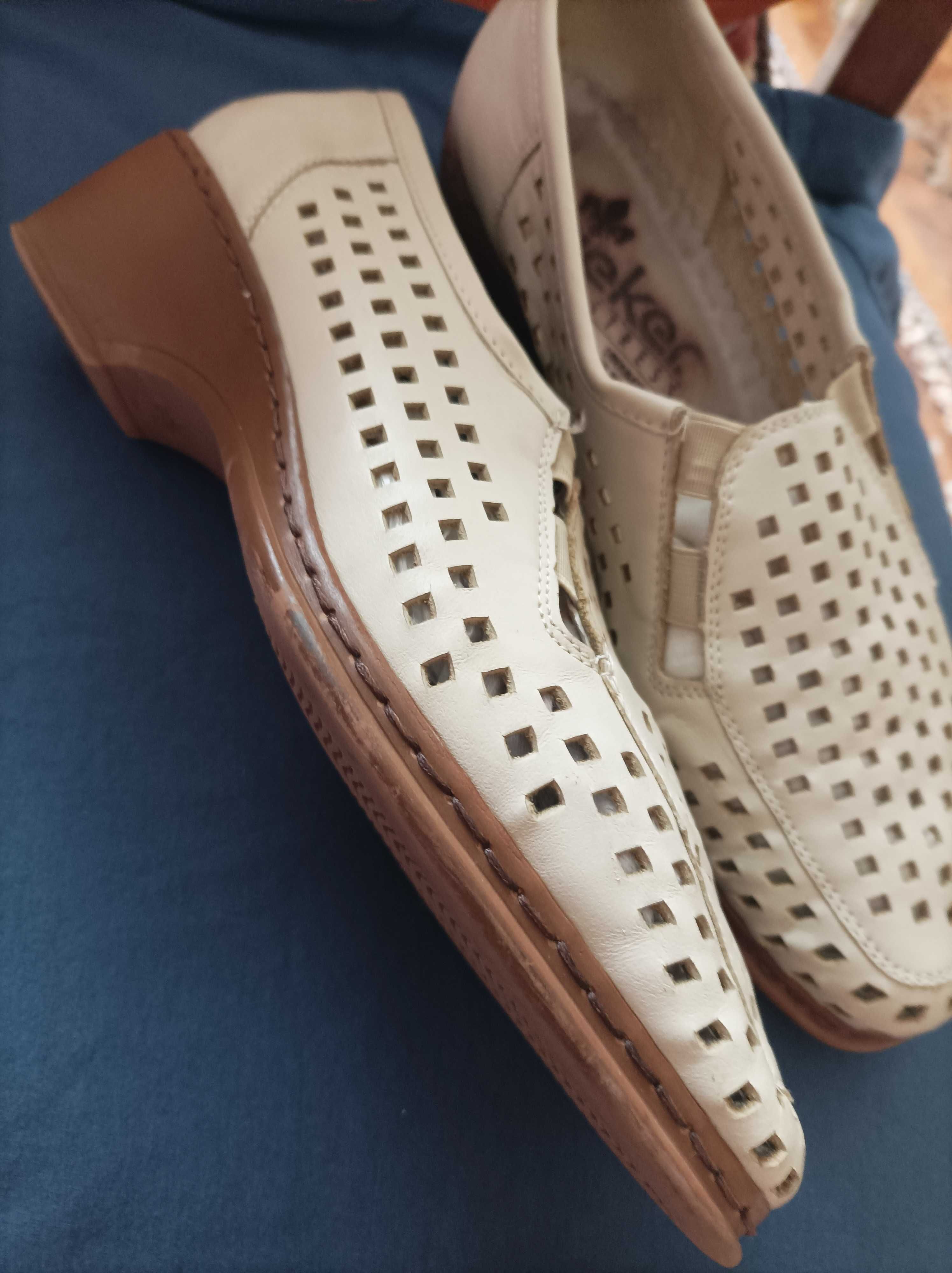 Продам женские кожаные летние туфли известной фирмы Rieker,и мужские