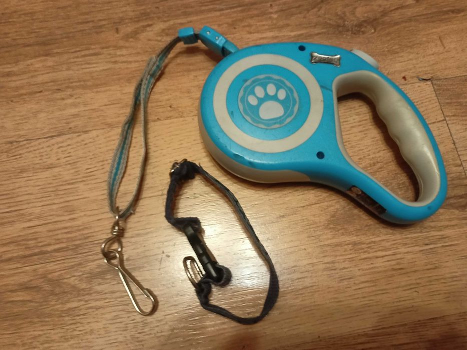 Wyciągana smycz z obrożą i mechanizmem powrotnym 5 m.