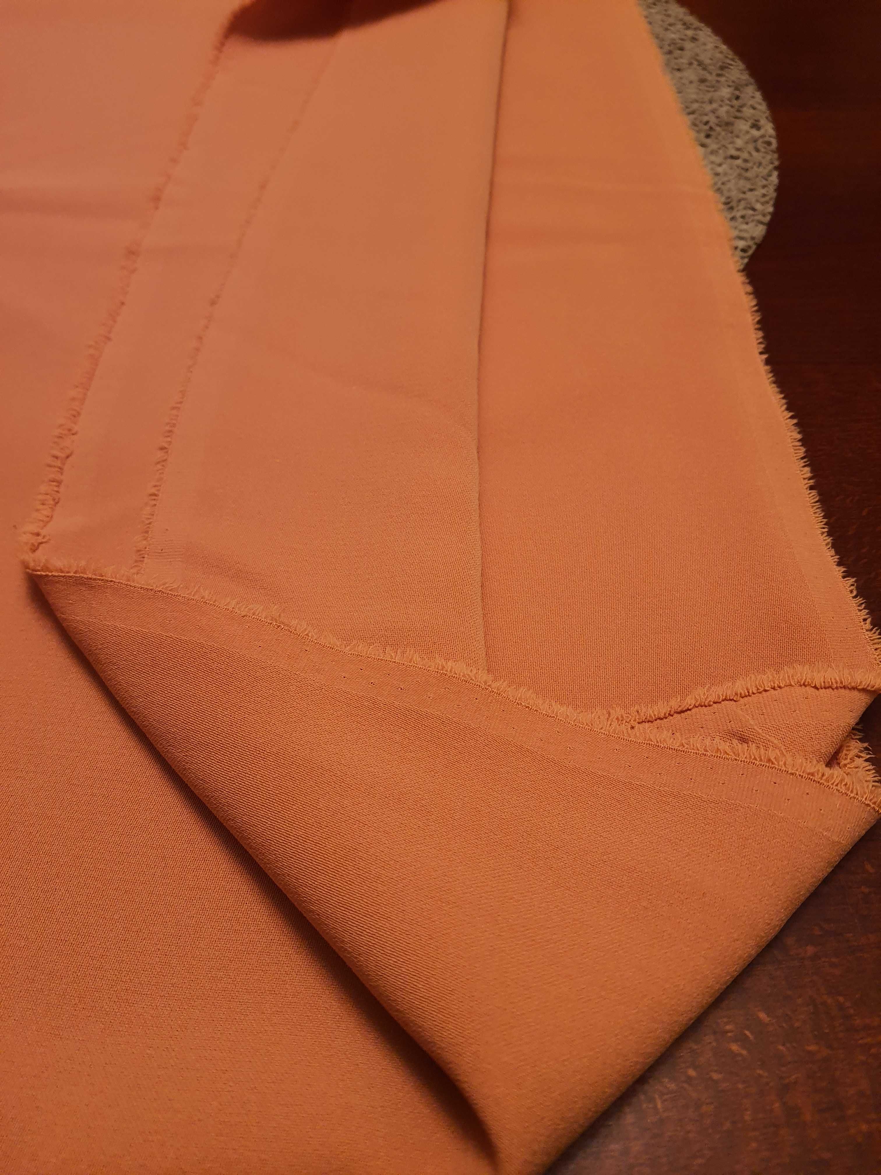 Kupon tkaniny w kolorze jasno pomarańczowym- lejącyn
