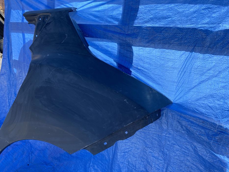 POSZYCIE błotnika lewe NISSAN LEAF I 10-17 lewy tył błotnik ćwiartka