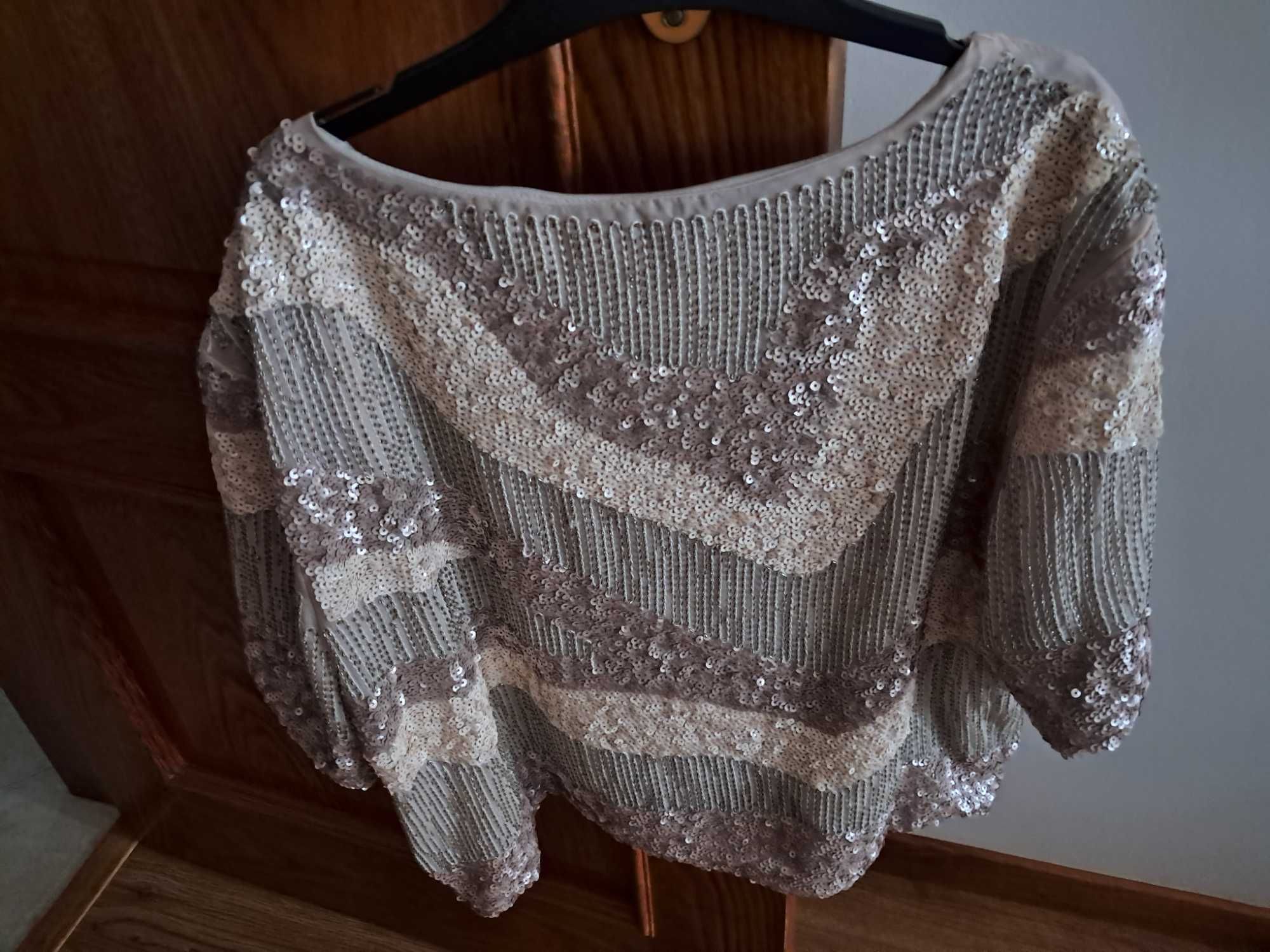Camisola de lantejoulas