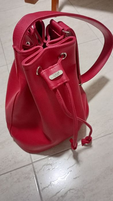 Mala vermelha em pele