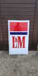Stary szyld reklamowy L&M