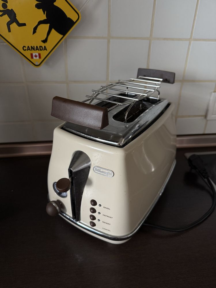 Тостер Delonghi