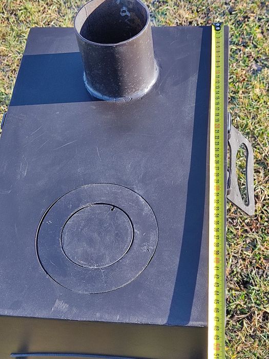 Буржуйка.з варочною поверхею.топка.кухня польова.печь.печка.пічка.камі