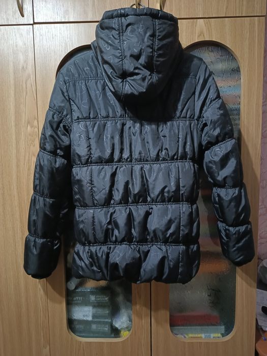 Тепла зимова куртка на дівчинку 10-11років